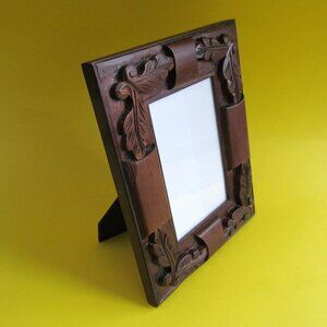 Carved wooden frame